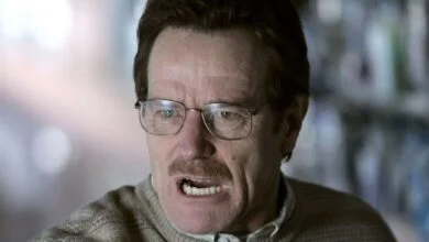 bryan cranston as walter white with dark hair and a sweater