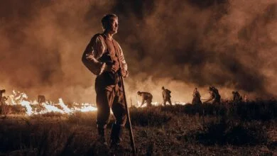 mads mikkelsen as the captain standing in the burning jutland in the promised land