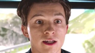 tom holland looking shocked as peter parker in spider man far from home